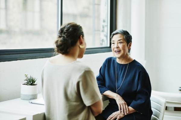 Two women talking